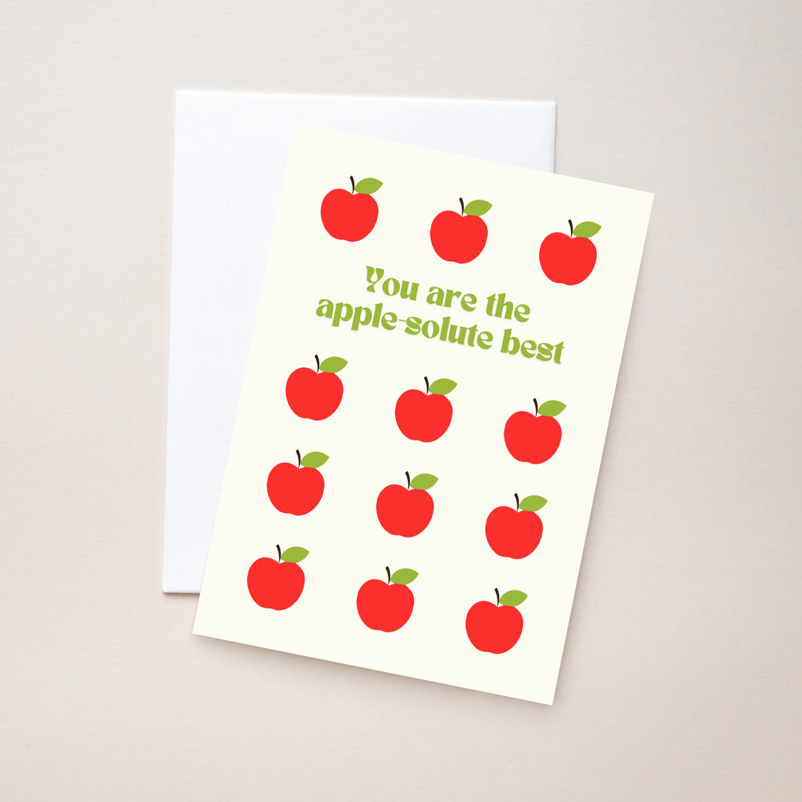 Teacher appreciation card with red apples on white with green text "You are the apple-solute best" on beige background. 