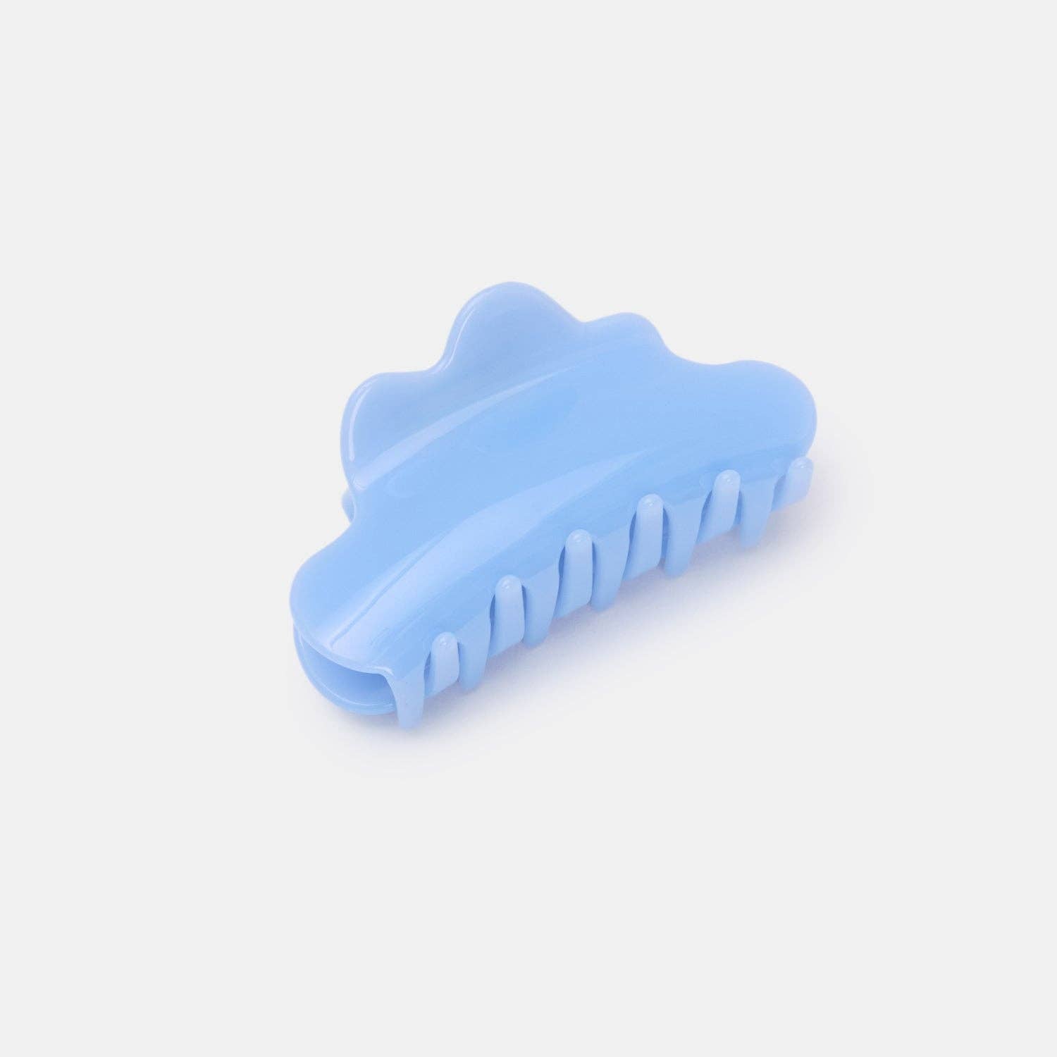 Blue hair claw shaped like a cloud on a white background.